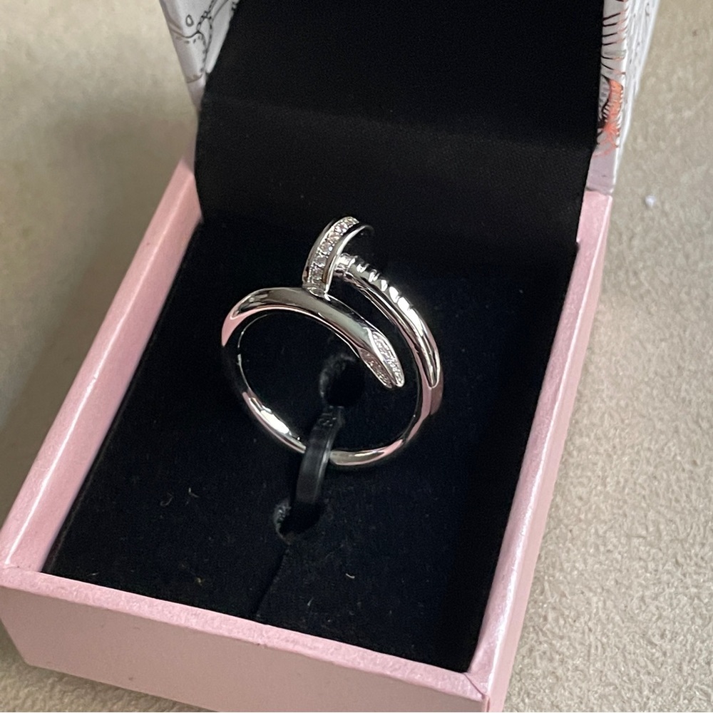 Peermont Rhodium Plated CZ crystal Nail Ring, NWOT. Size 9